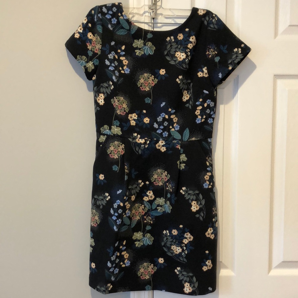 Navy floral dress with scoop neck back and pockets